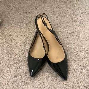 Black patent closed toe sling back pump